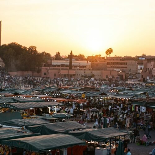 wide-angle photography of people gathering near outdoor during daytime