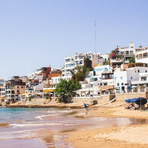 white building near sea during daytime