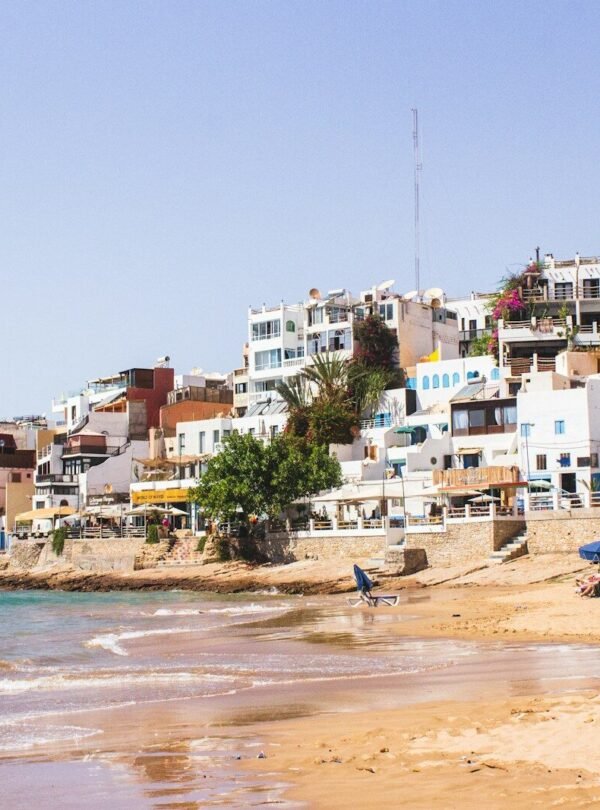 white building near sea during daytime