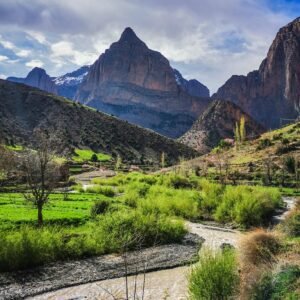 Mountainous landscape with flowing river.