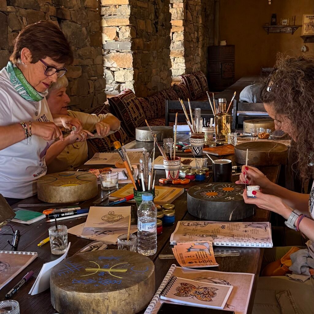 Participants engaged in traditional art workshop