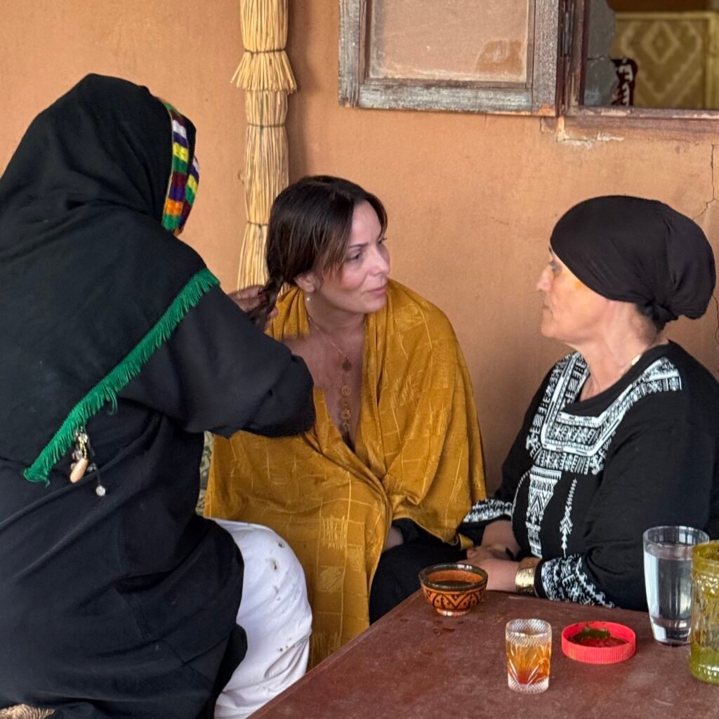 Women engaged in conversation and grooming
