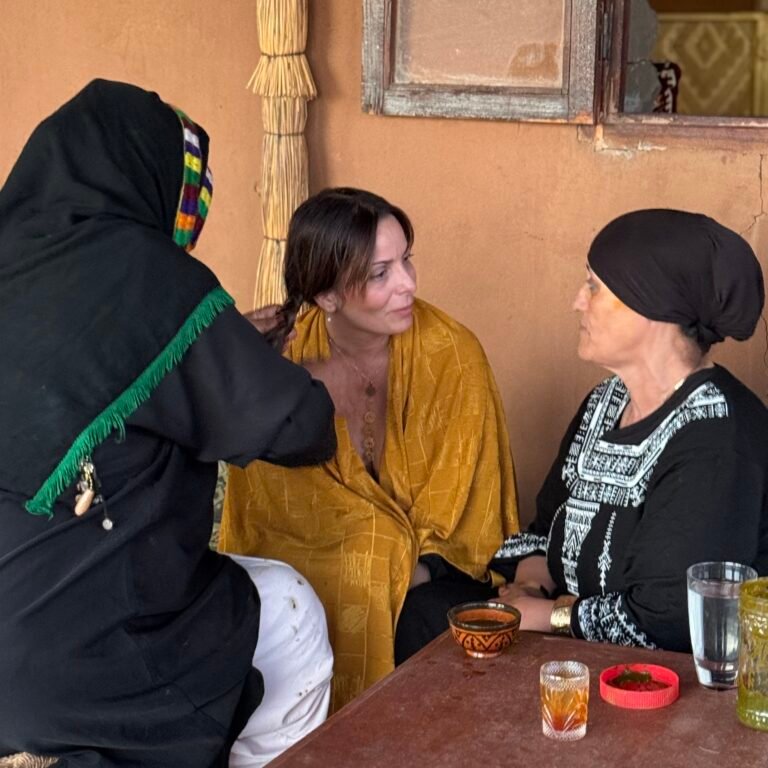 Women engaged in conversation and grooming