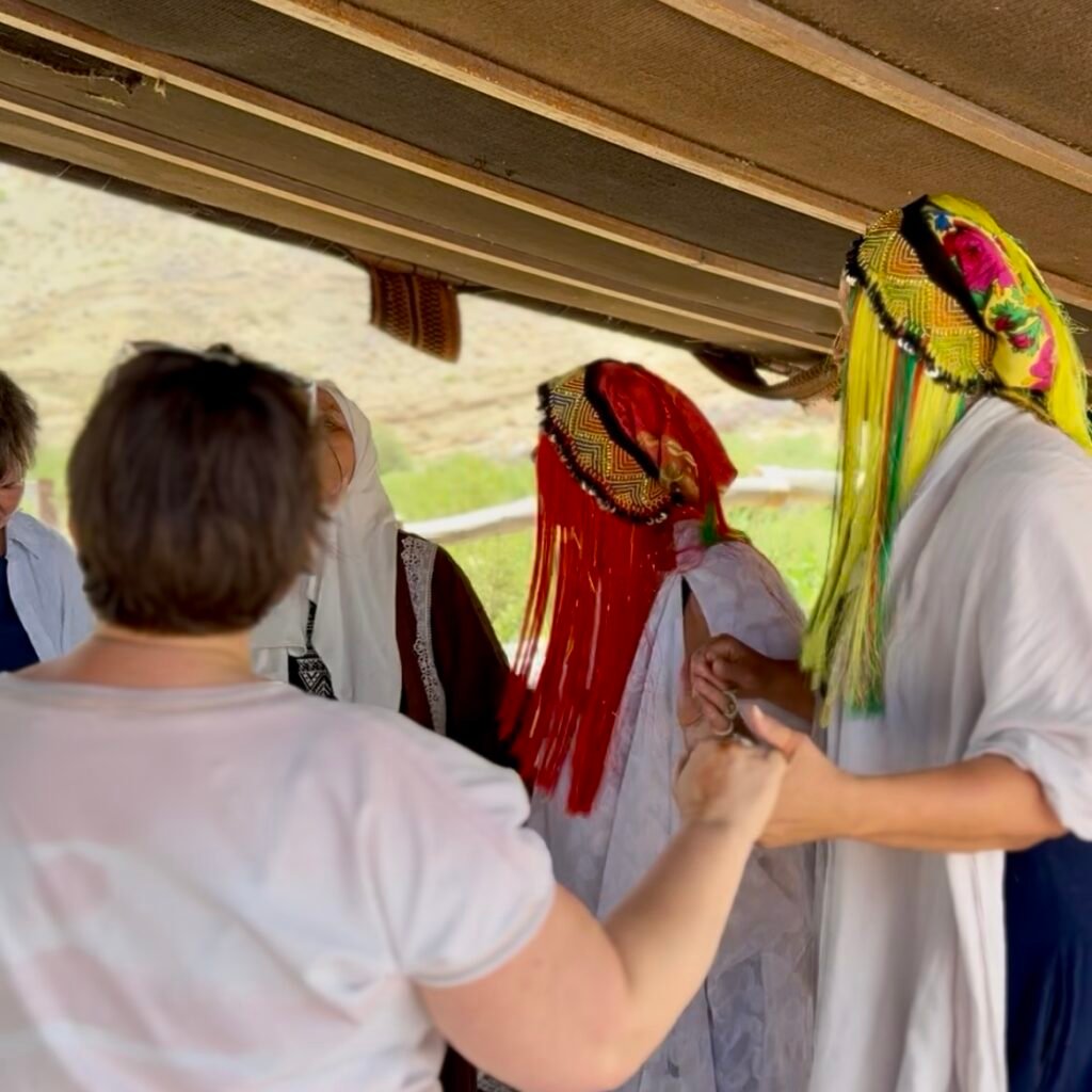 Tourists interacting with Amazigh women