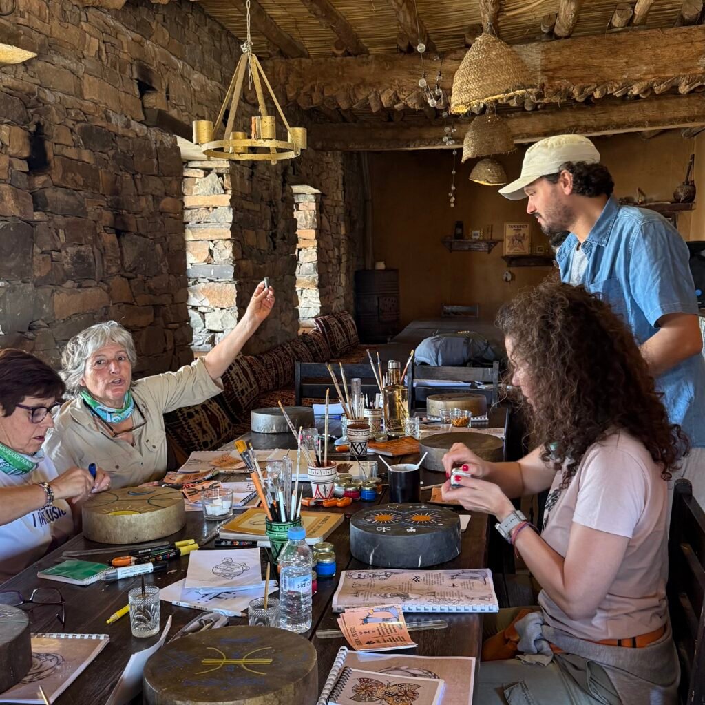 Group creating art in workshop setting.