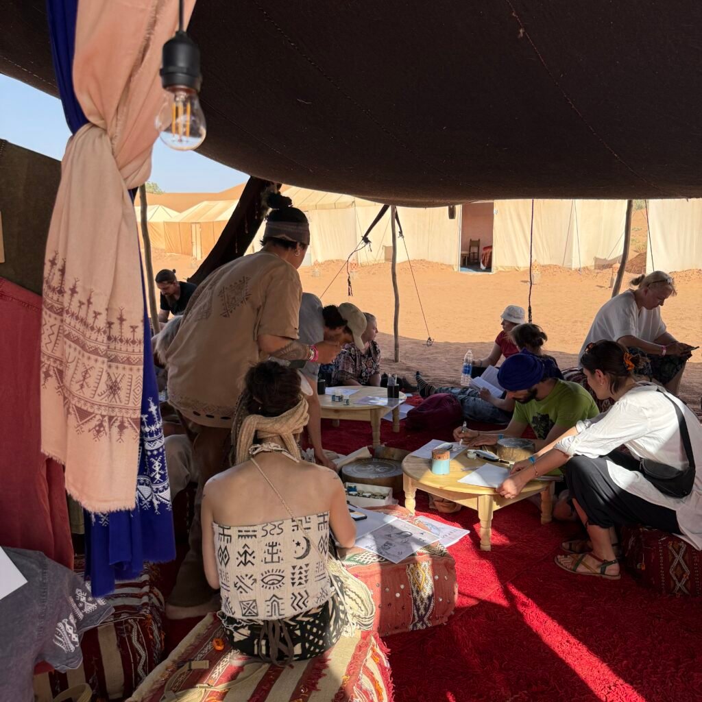 Workshop inside a cozy desert tent.