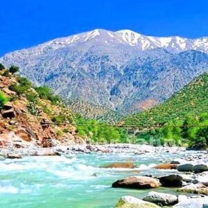 Scenic river flowing through mountains.